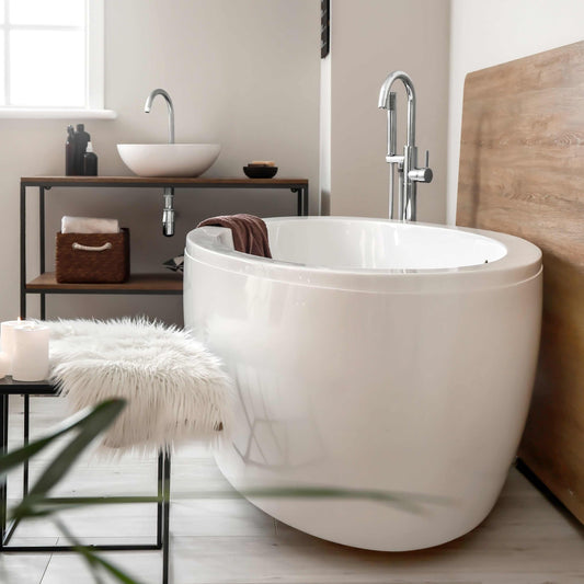 ZLINE Emerald Bay Bath Tub Filler in a modern bathroom setting with a white bathtub and wooden accents.