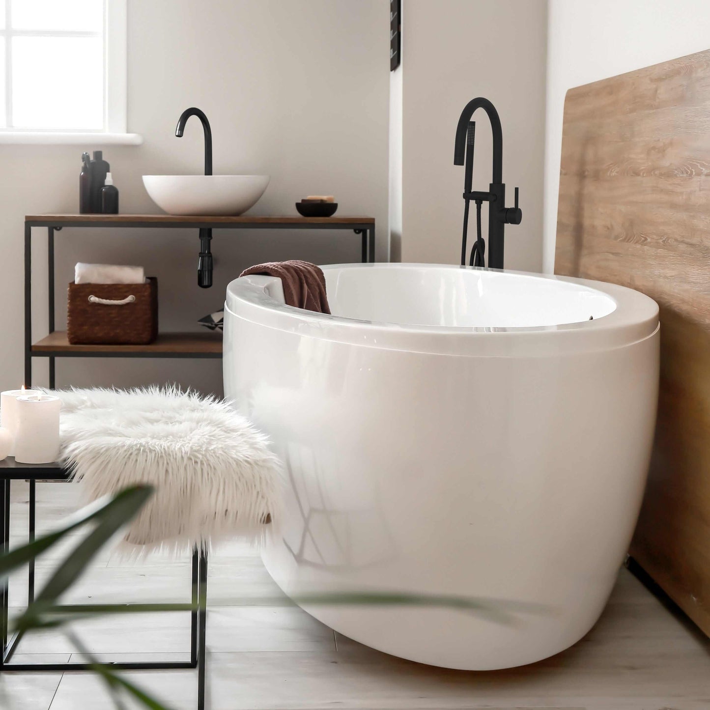 ZLINE Emerald Bay Bath Tub Filler in a modern bathroom setting with a stylish freestanding tub and elegant decor.