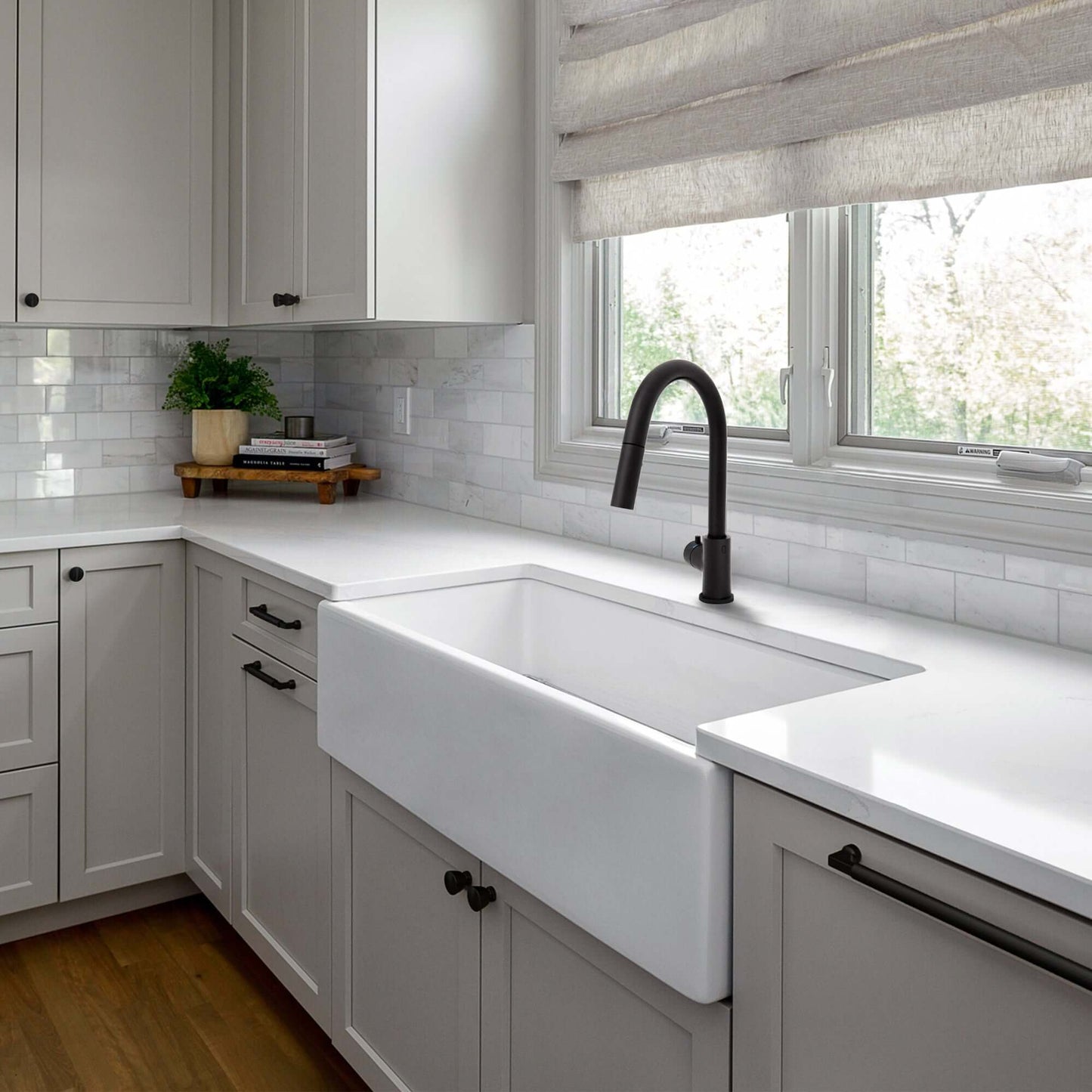 ZLINE Gemini Touchless Kitchen Faucet (GEM-KFS-MB) in stylish matte black finishing the modern kitchen design.