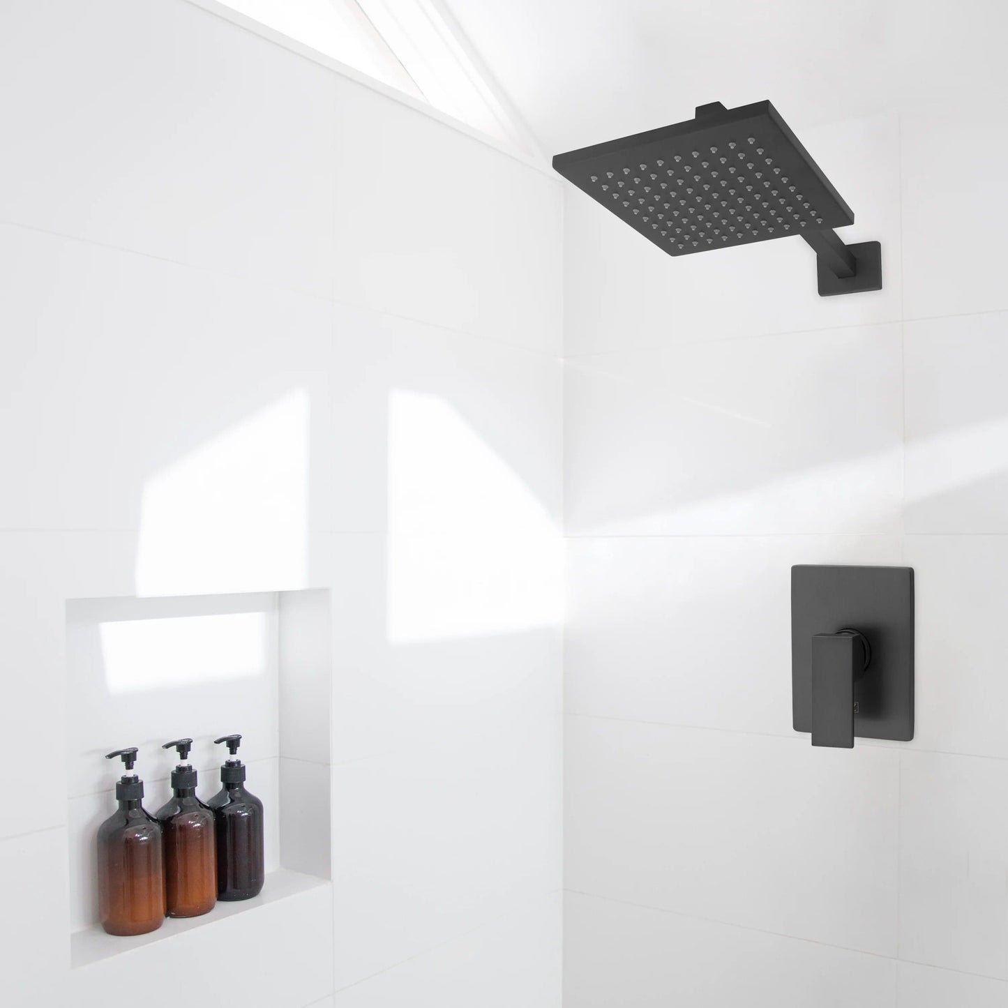 ZLINE Bliss Shower Faucet (BLS-SHF-PG) displayed in a modern shower setting with sleek black fixtures.