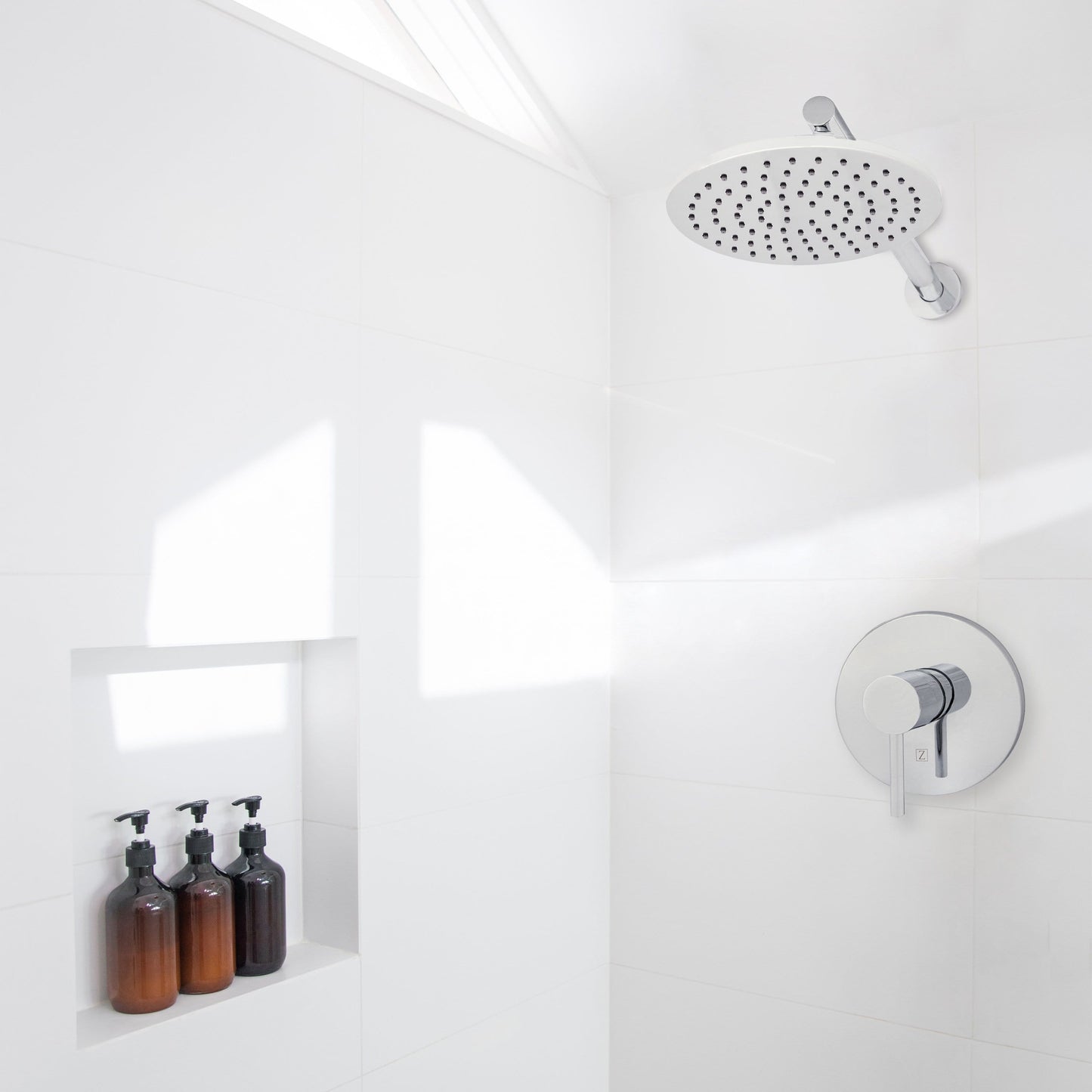 ZLINE El Dorado Shower Faucet installed in a modern white shower with rain showerhead and stylish soap dispensers.