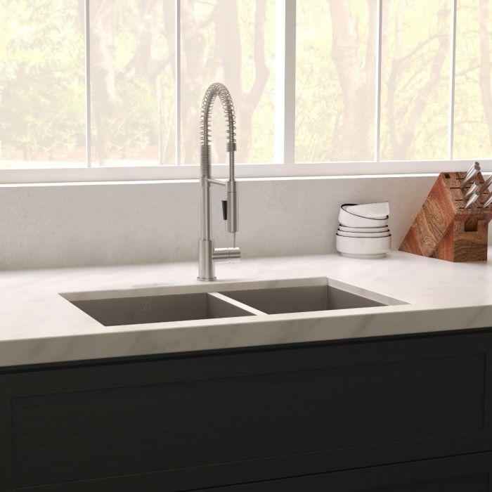 ZLINE Chamonix 33" Undermount Double Bowl Sink in DuraSnow® Stainless Steel (SR60D-33S) with modern faucet and countertop.