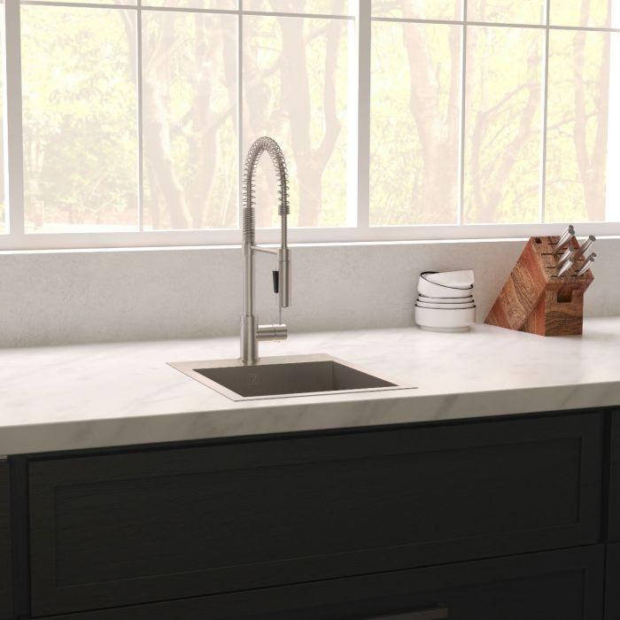 ZLINE Donner 15" DuraSnow® Topmount Bar Sink STS-15S installed in modern kitchen with stylish faucet and accessories.