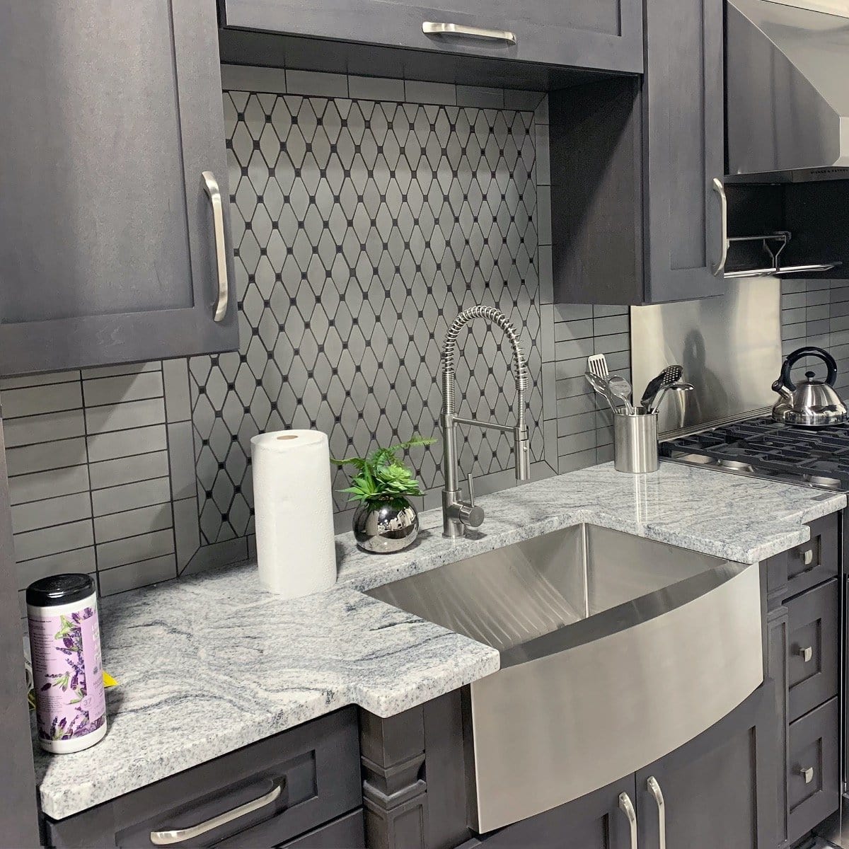 ZLINE Zermatt Farmhouse 30" Apron Mount Single Bowl Sink in Stainless Steel (SAS-30) installed in a modern kitchen.