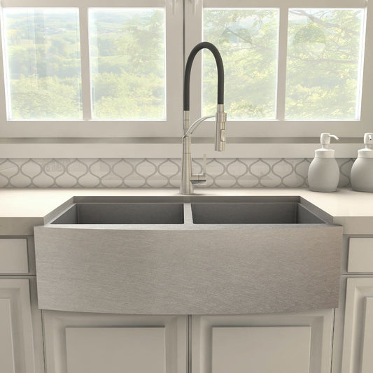 ZLINE Da Vinci Brushed Nickel Kitchen Faucet DAV-KF-BN installed above a stylish farmhouse sink in a bright kitchen.