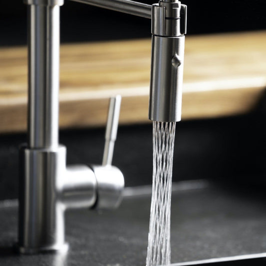 ZLINE Voltaire Chrome Streamlined Kitchen Faucet VLT-KF-CH featuring sleek design and flowing water.